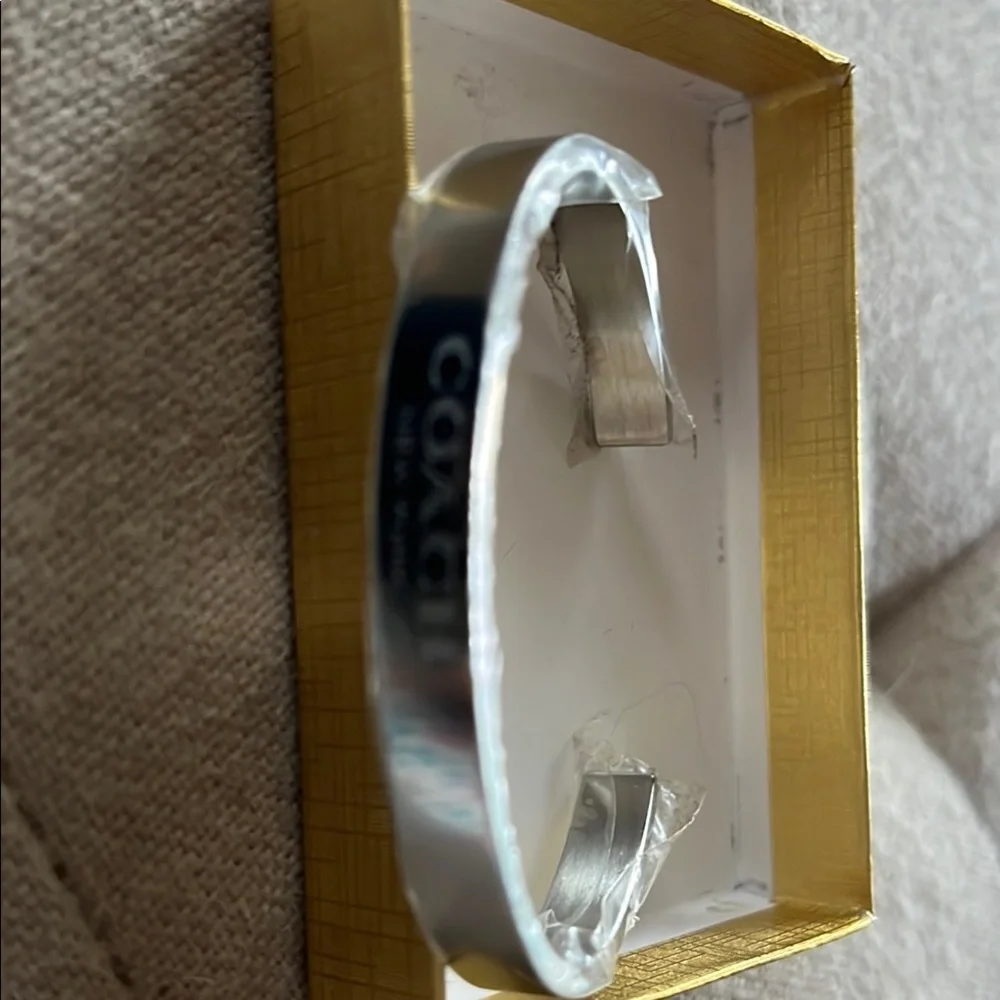 Coach Silver Arm & Wristband Clip